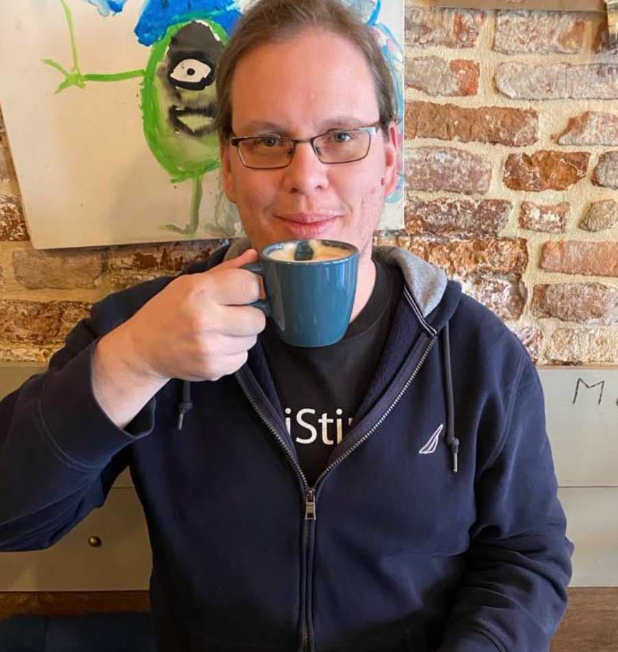 Professor Matt Weller sipping his hot beverage of choice. 